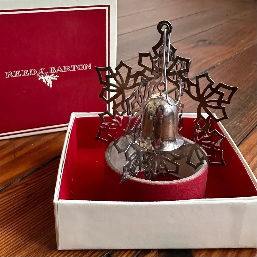 Vintage Reed & Barton silver spinning snowflake  & bell Christmas ornament